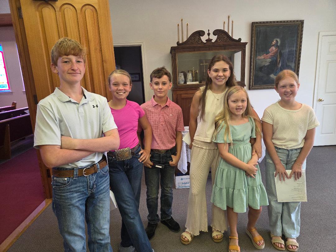 Happy children from St. John Lutheran Church Cat Spring enjoying summer activities.